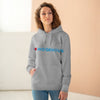 A woman wearing a grey hoodie