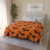  Fleece Blanket | Vibrant Orange | On top of the bed